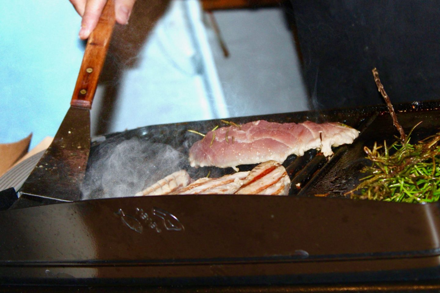 24 hours in Ljubljana food & wine: meat searing on a grill at open market