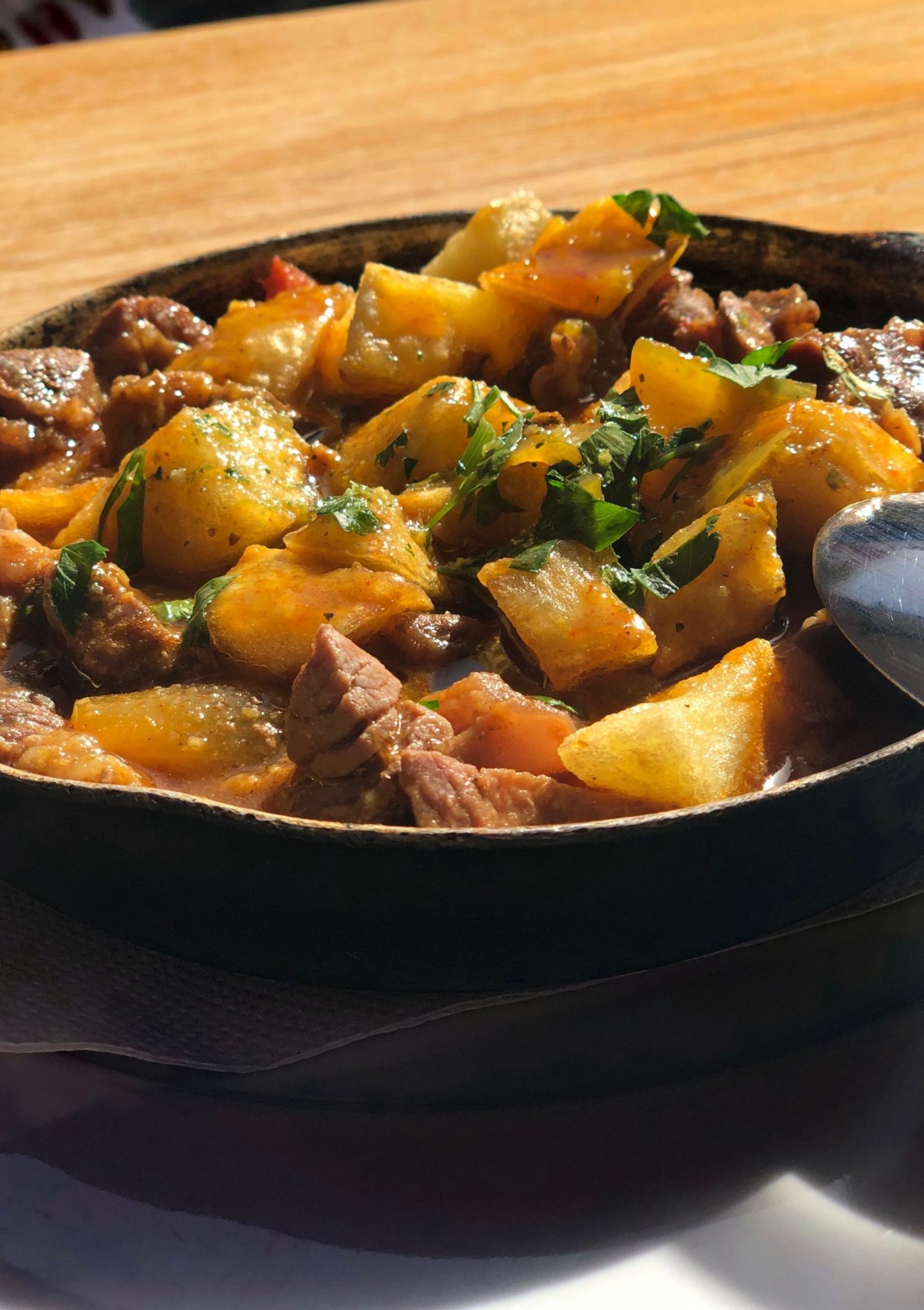 best tapas restaurants in Playa Blanca, Lanzarote - beef and potato stew in a black tapas dish